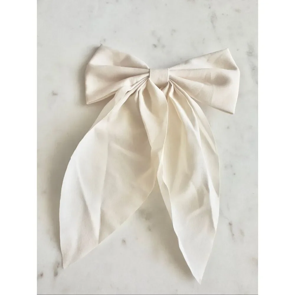 Cream color clip hair bow